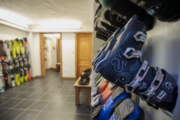 Boot room with rental skis from Doorstep Skis in Atlas Sky Chalet-Apartment